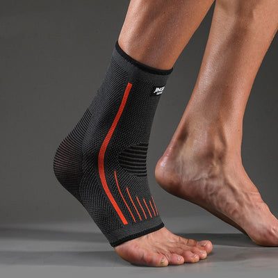 Black and orange compression ankle brace for ankle support and pain relief